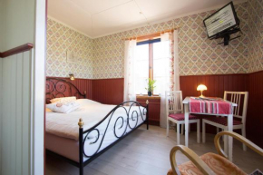 Prinsgården B&B rum stugor